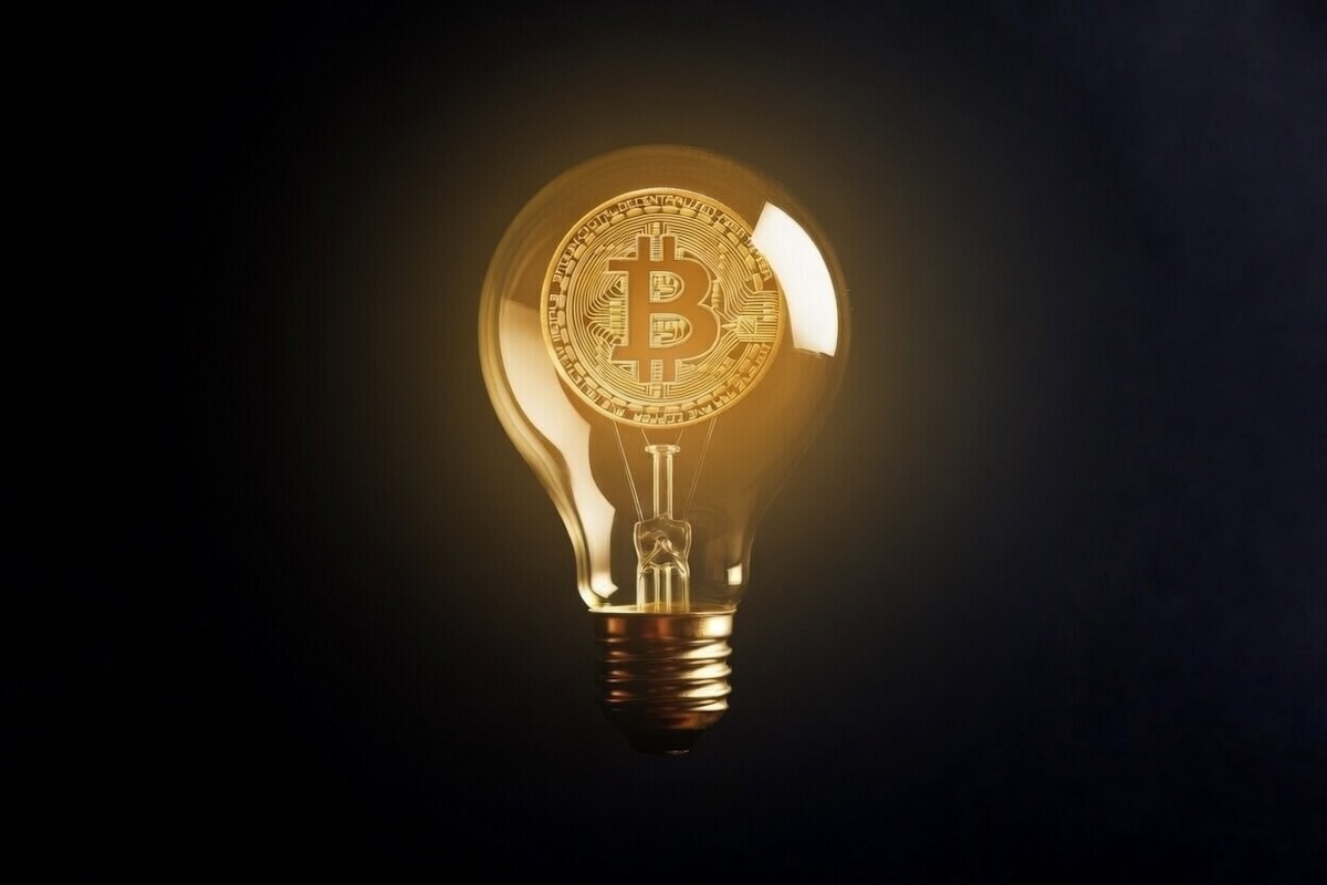 Bitcoin symbol illuminated in a light bulb. Image credit: AI generated/ThisIsAfrica.